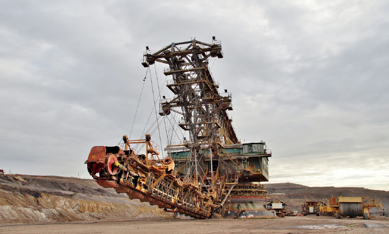 Rugged mining machinery in an open pit mine.